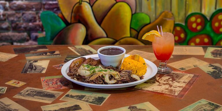 El Meson de Pepe dish and drink on a table