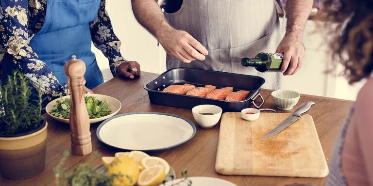 closeup of people preparing food for cooking
